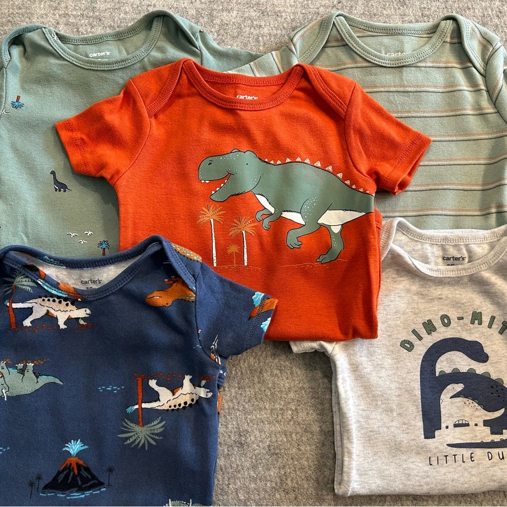 Carter’s gently used onesies. 18 month.